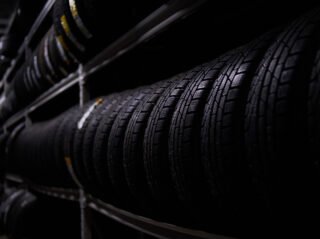 Variety of tyres at busy warehouse